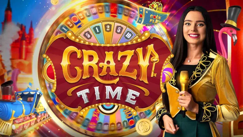 Arte promocional de Crazy Time con la presentadora junto a la rueda gigante de colores y un tren azul de fantasía.